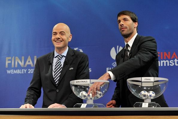 UEFA General Secretary Gianni Infantino and Ruud van Nistelrooy proceed to the UEFA Champions League semi-final and final draws at the UEFA headquarters on April 12, 2013 in Nyon, Switzerland. (Photo by Harold Cunningham/Getty Images)